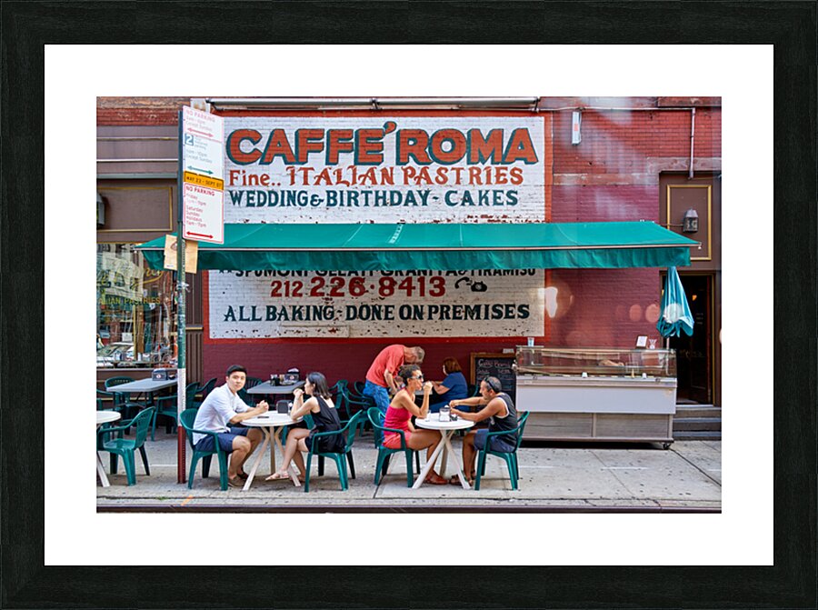 Visitors enjoy pastries at Caffe Roma in Little Italy New York Picture Frame print