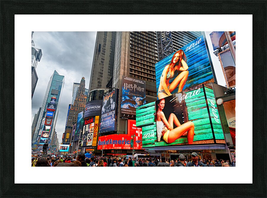 Crowd gathers in Times Square with bright ads in New York City Picture Frame print