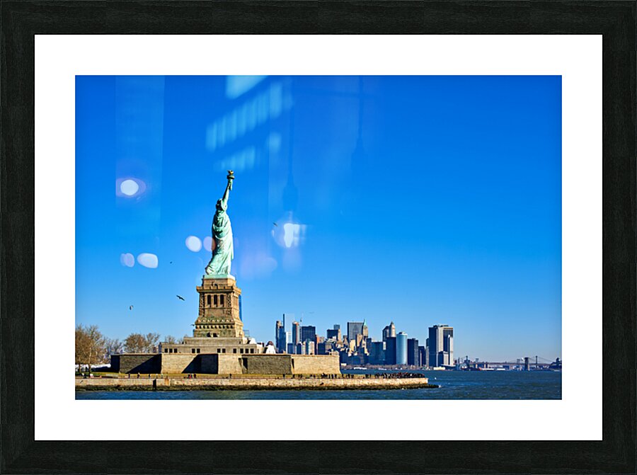 Statue of Liberty stands tall on Liberty Island in New York City Picture Frame print
