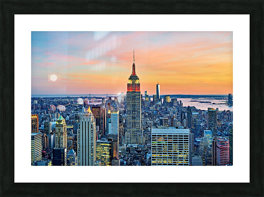 Aerial view of Empire State Building at sunset in New York City Picture Frame print