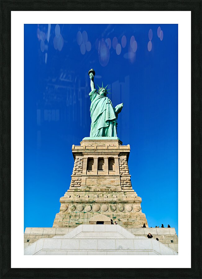 Statue of Liberty stands proudly on Liberty Island in Manhattan Picture Frame print