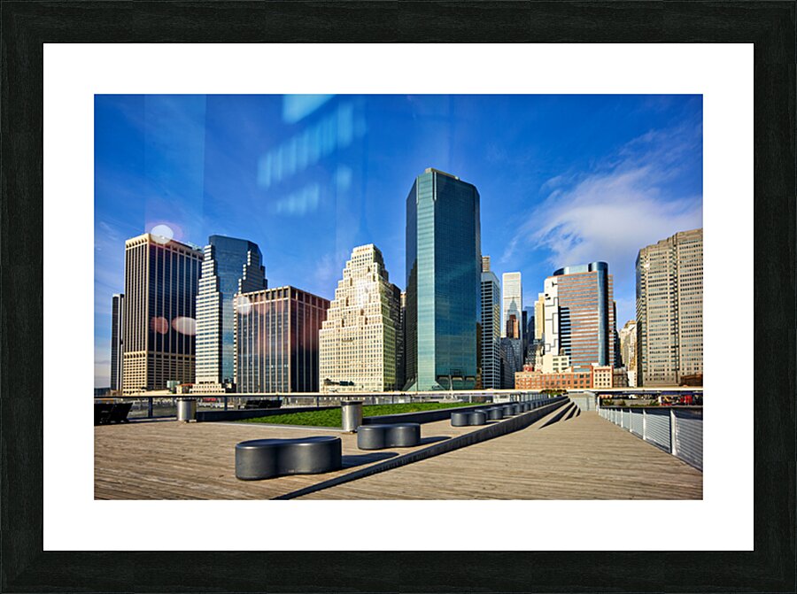Manhattan skyline view with skyscrapers and waterfront area Picture Frame print