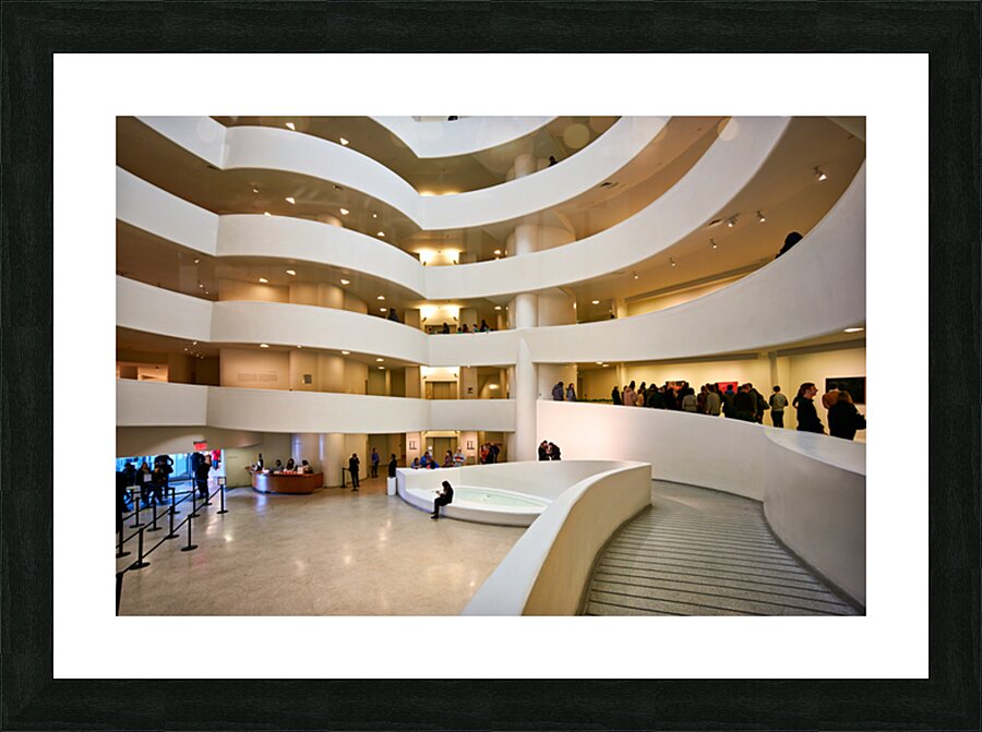 Visitors explore interior of Solomon R. Guggenheim Museum in New Picture Frame print