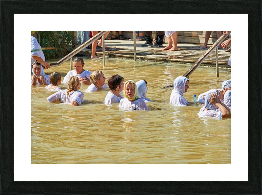 Visitors participate in baptism ceremony at Jordan River site Picture Frame print