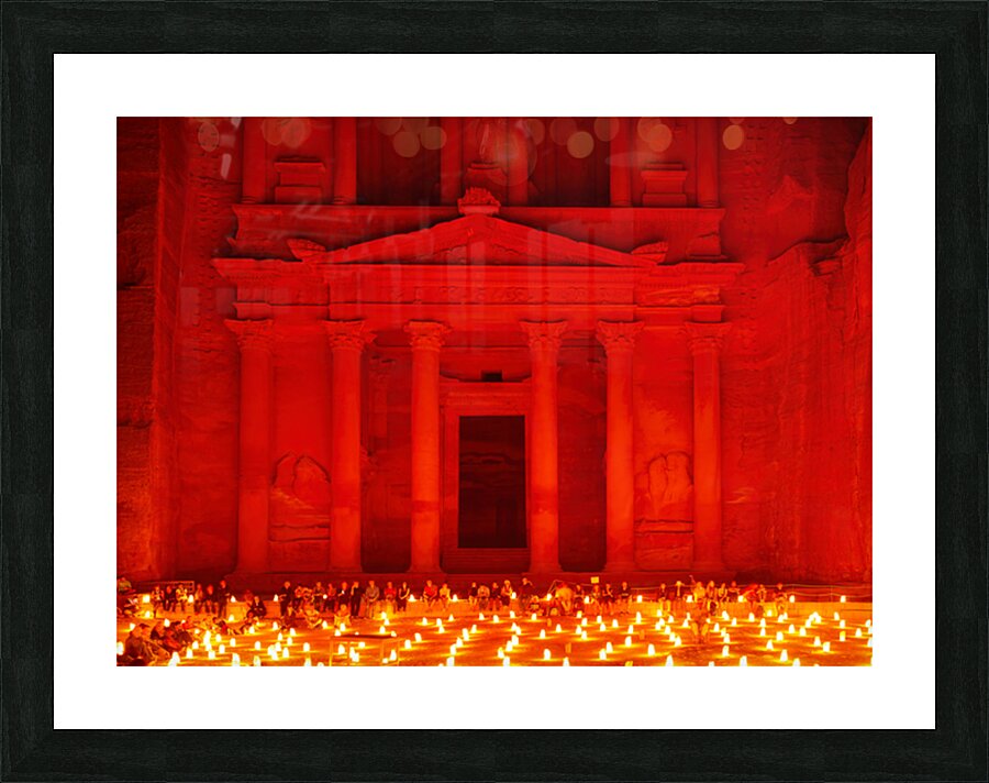 Visit to Petra at night with the Treasury lit by candles Picture Frame print