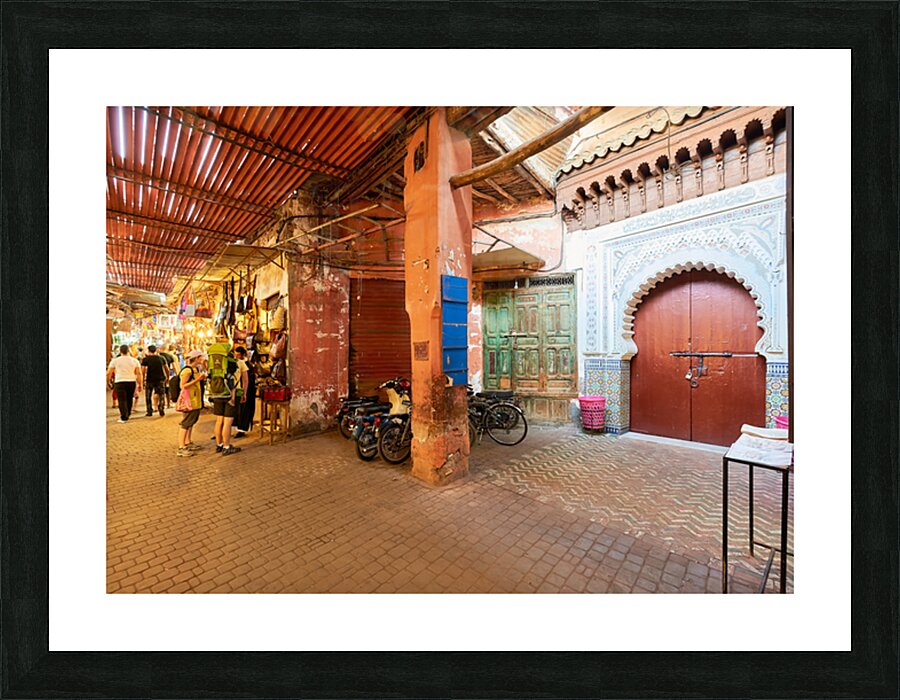 Exploring the souk in Marrakesh Morocco during daytime hours Picture Frame print
