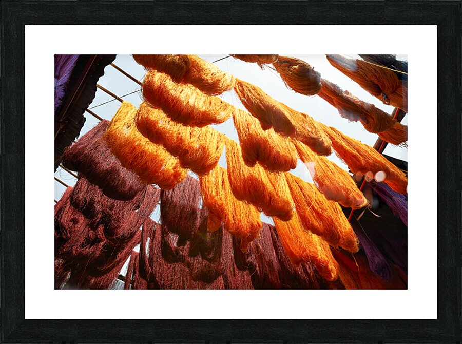 Colorful threads hanging in the dyers souk of Marrakesh Morocco Picture Frame print