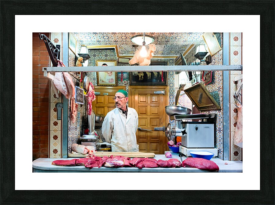 Butcher sells camel meat in the souk of Meknes Morocco Picture Frame print