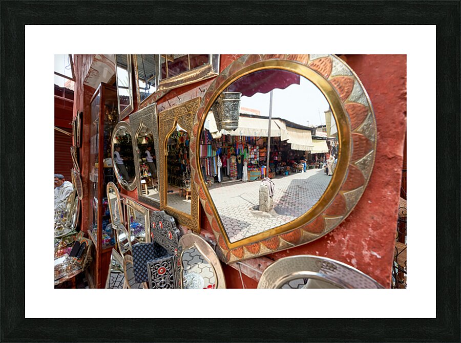 Life in the souk of Marrakesh showing local shops and items Picture Frame print