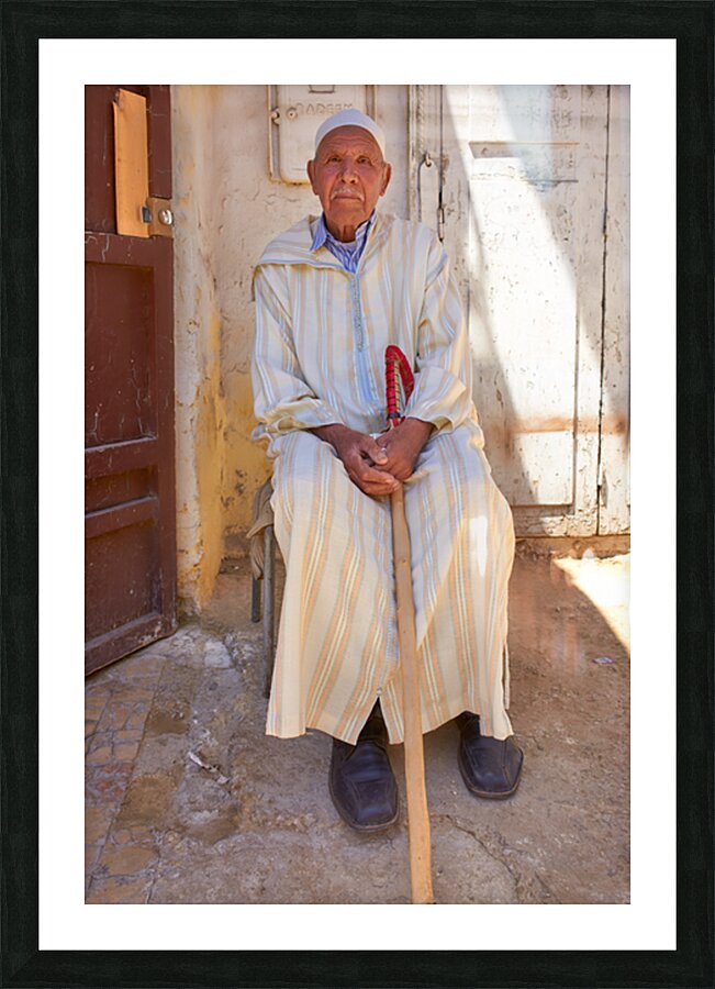 Old man sitting in Meknes Morocco in daylight Picture Frame print
