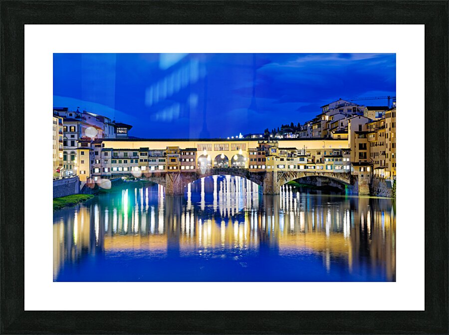 Ponte Vecchio bridge in Florence under evening sky over river Ar Picture Frame print