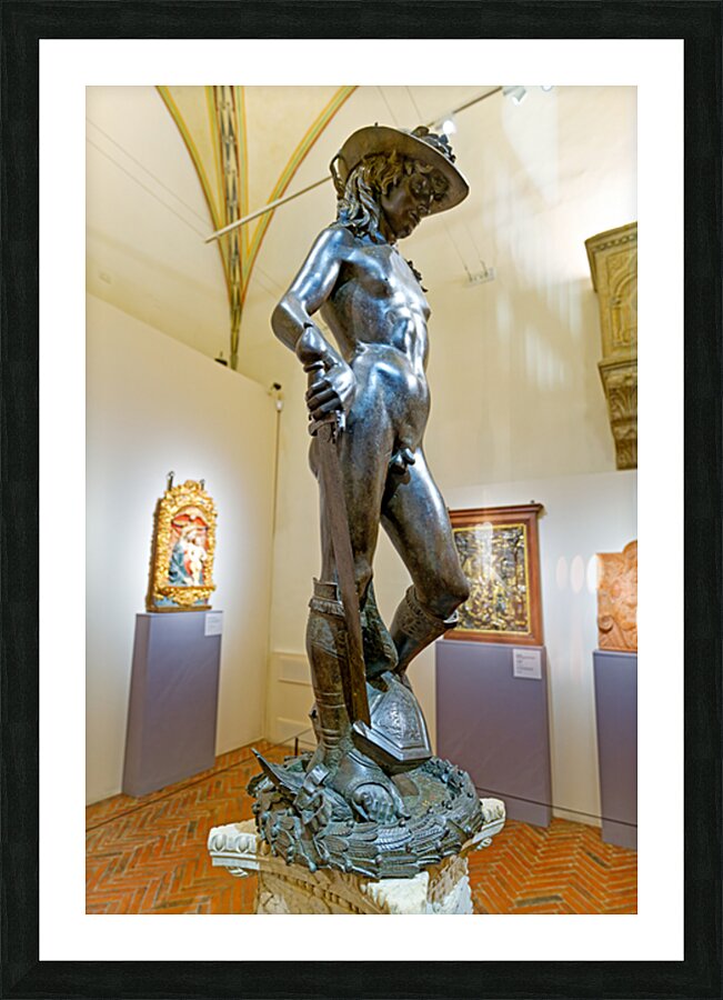 Bronze David stands in Museo Nazionale del Bargello in Florence Picture Frame print