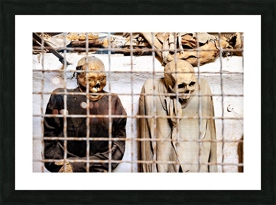 Visitors see mummies in Capuchin Catacombs in Palermo Sicily Picture Frame print