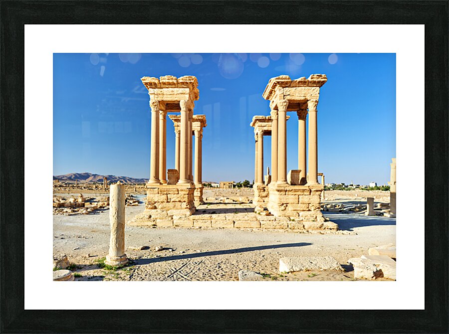 Exploring the Tetrapylon at Palmyra in Syria during the day Picture Frame print
