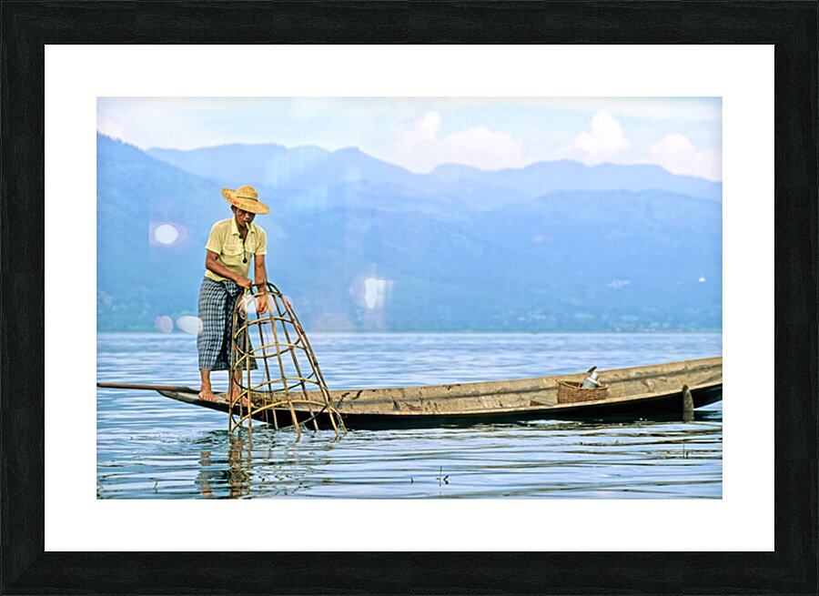 Traditional fishing on Inle Lake in Myanmar by local fisherman Picture Frame print
