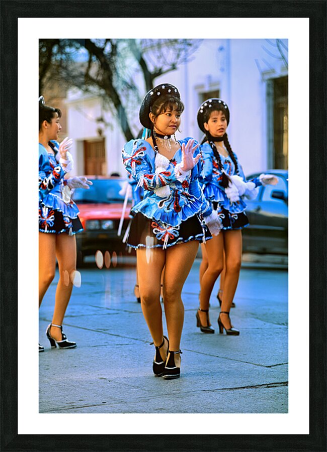 Dancers in blue costumes perform during cultural festival in Arg Picture Frame print