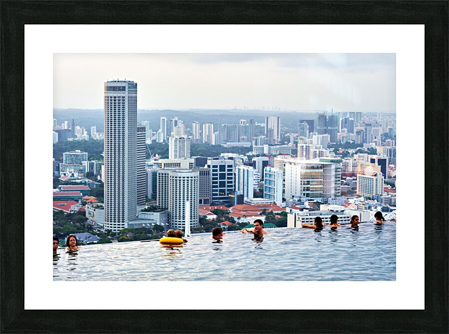 Visitors enjoy the Infinity Pool at Marina Bay Sands Picture Frame print