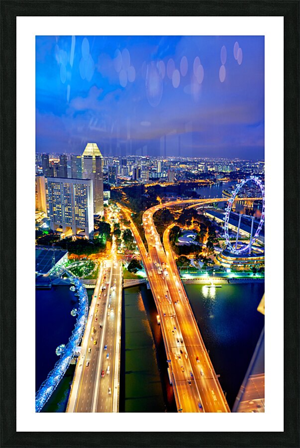 City lights shine in Marina Bay as sunset brings night activity Picture Frame print
