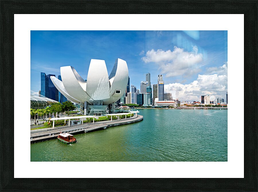 Visitors view ArtScience Museum and city skyline in Singapore Picture Frame print