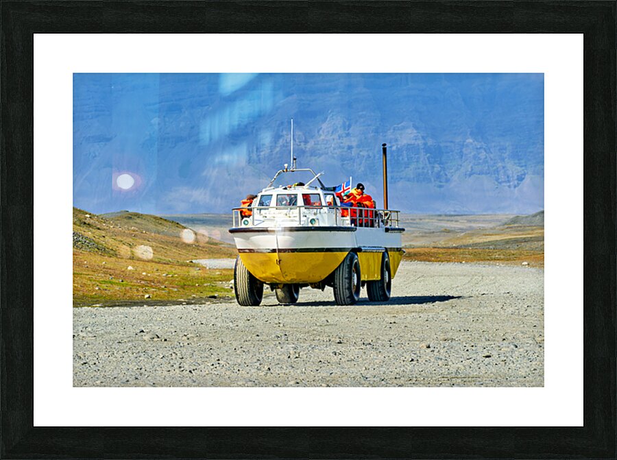 Exploring Jokulsarlon Glacier Lagoon with amphibian vehicle Picture Frame print