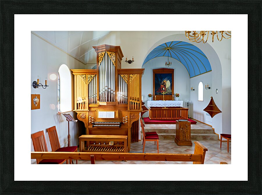 Wooden church interior with organ in Vik i Myrdal Iceland Picture Frame print