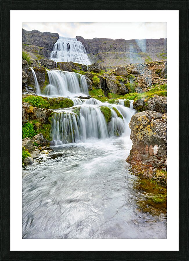 Gongumannafoss waterfall in Iceland with flowing water Picture Frame print