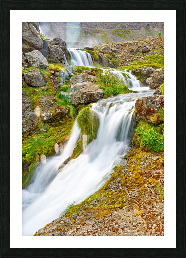 Gongumannafoss waterfall flows in Iceland during daylight hours Picture Frame print