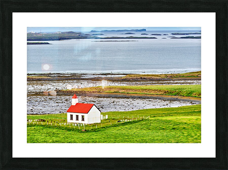 Church stands in western fjords of Iceland near the sea Picture Frame print