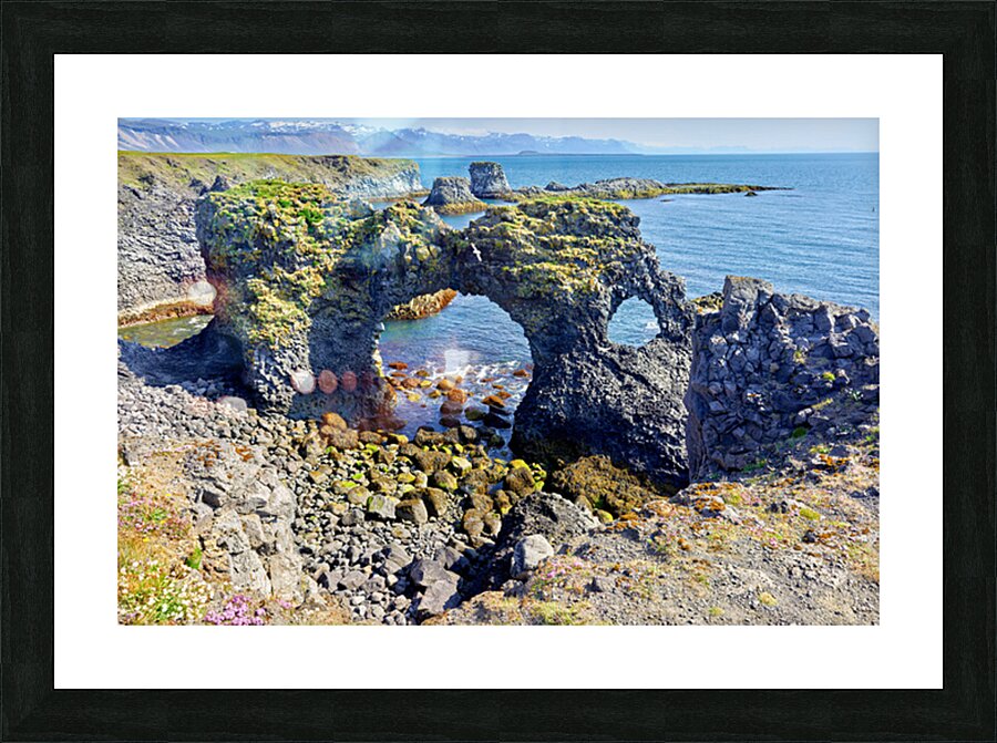 Exploring arnarstapi cliff in Iceland by the ocean Picture Frame print