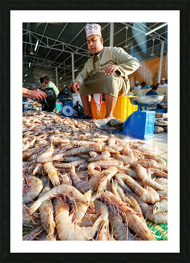 Fish market in Muscat Oman shows vendor and fresh catch Picture Frame print