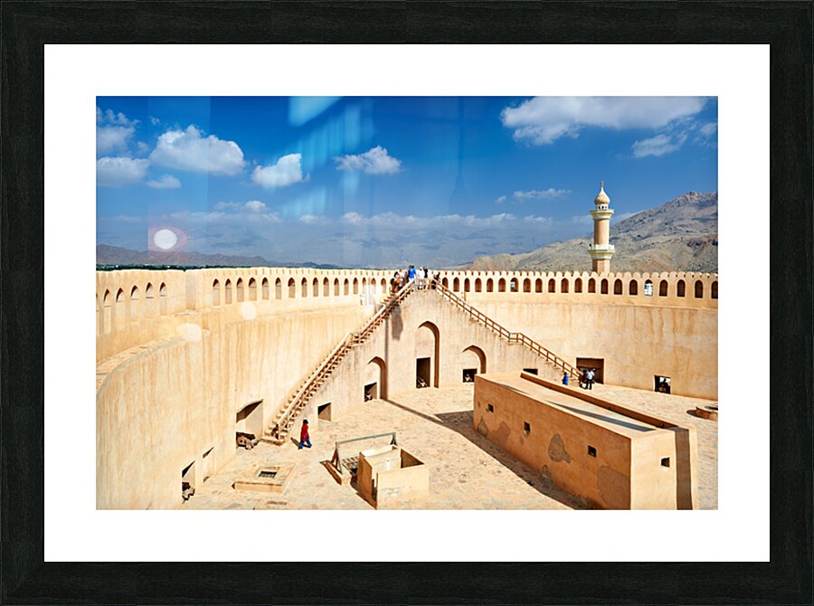Visit to Nizwa Fort in Oman with visitors and open sky Picture Frame print