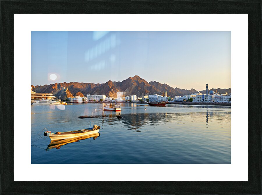 Waterfront view in Muscat Oman at sunset near boats Picture Frame print