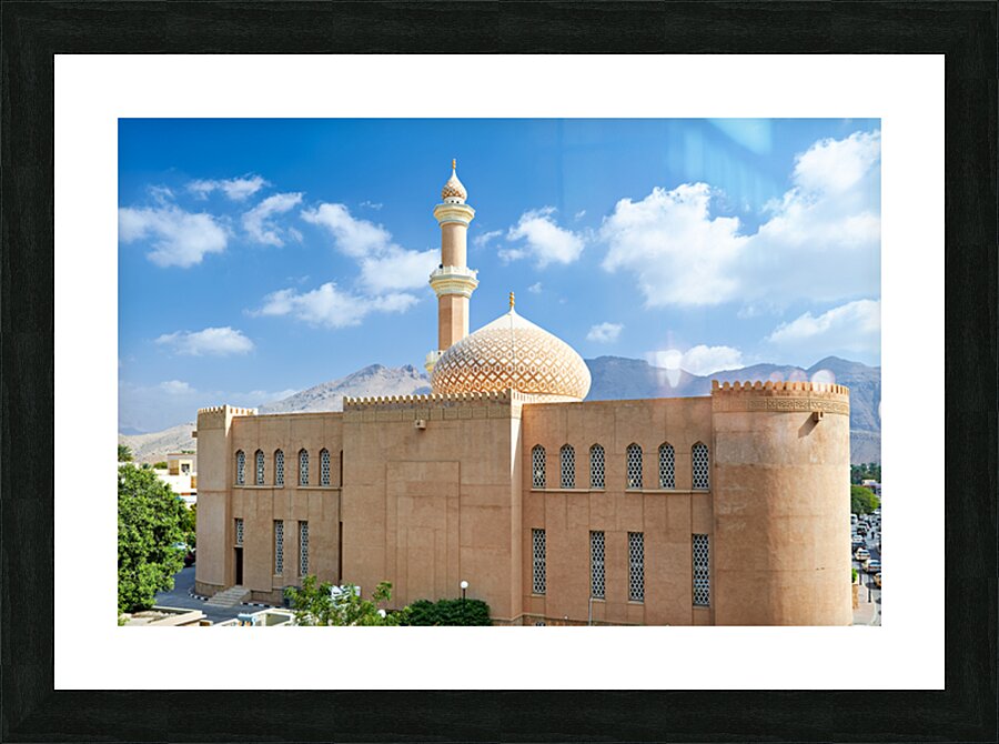 Nizwa Fort view with mountains and clouds in Oman Picture Frame print