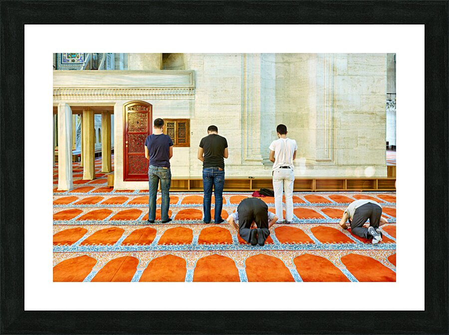 People pray inside Suleymaniye Mosque in Istanbul Turkey Picture Frame print