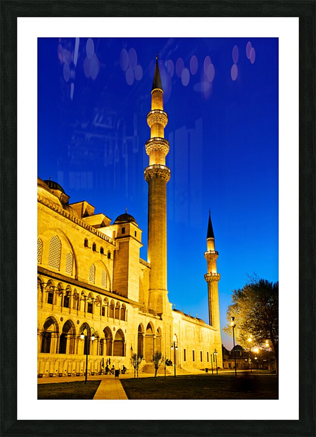 Suleymaniye Mosque stands tall in Istanbul at night Picture Frame print