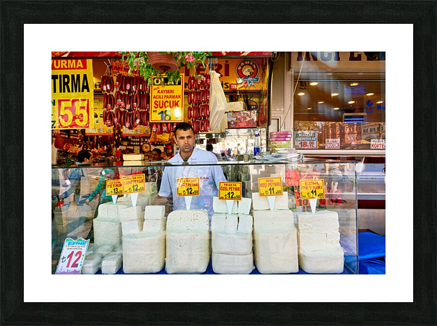 Cheese vendor at Grand Bazaar in Istanbul during busy hours Picture Frame print