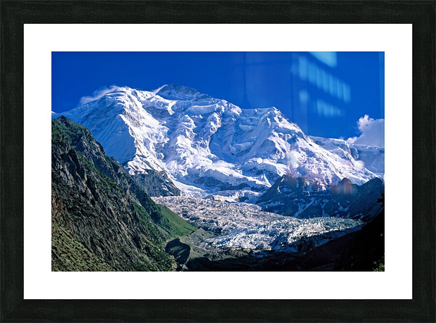 Karakoram range shows snow capped peaks and rocky terrain Picture Frame print