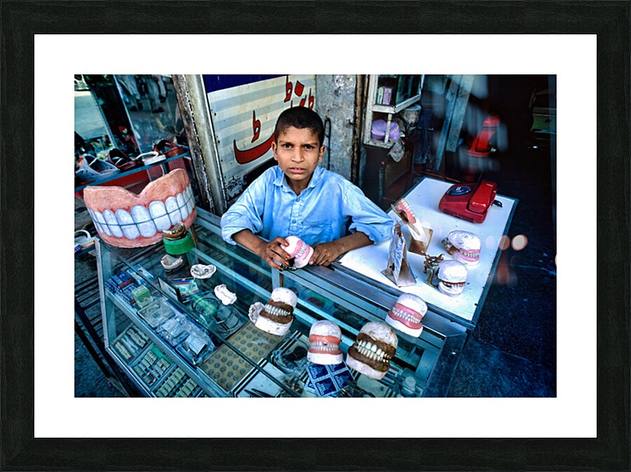 Street dentist offers services in Peshawar with dental models Picture Frame print