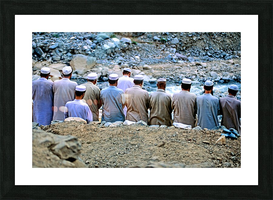 Muslim men pray outdoors in Pakistan facing Mecca Picture Frame print
