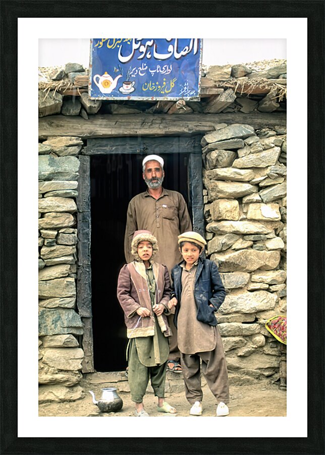 Family near shop at Shandur Pass in Pakistan Picture Frame print