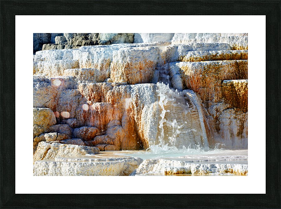 Water flowing over the terraces at Devils Thumb in Yellowstone Picture Frame print