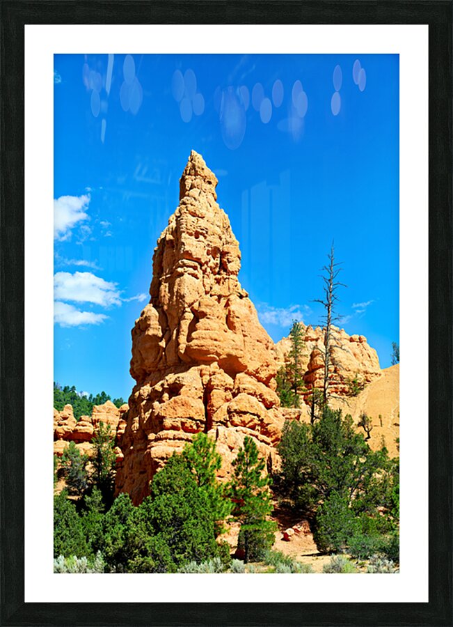 Rock formation towers over trees in Dixie National Forest Picture Frame print