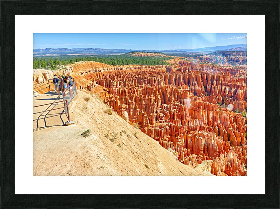Visitors enjoy the view at Bryce Canyons Inspiration Point Picture Frame print