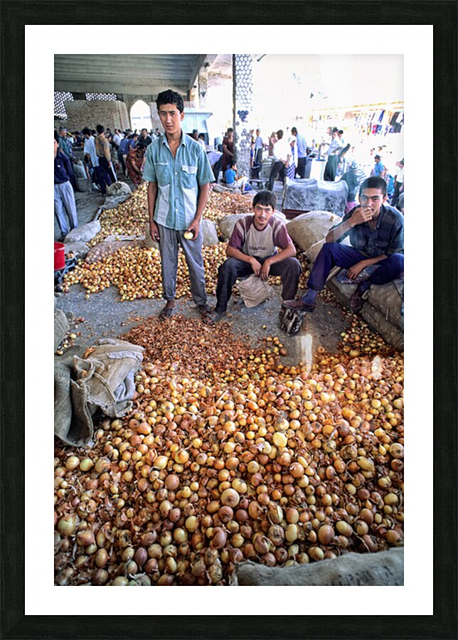 Young vendors sell onions in a market in Khiva Uzbekistan Picture Frame print