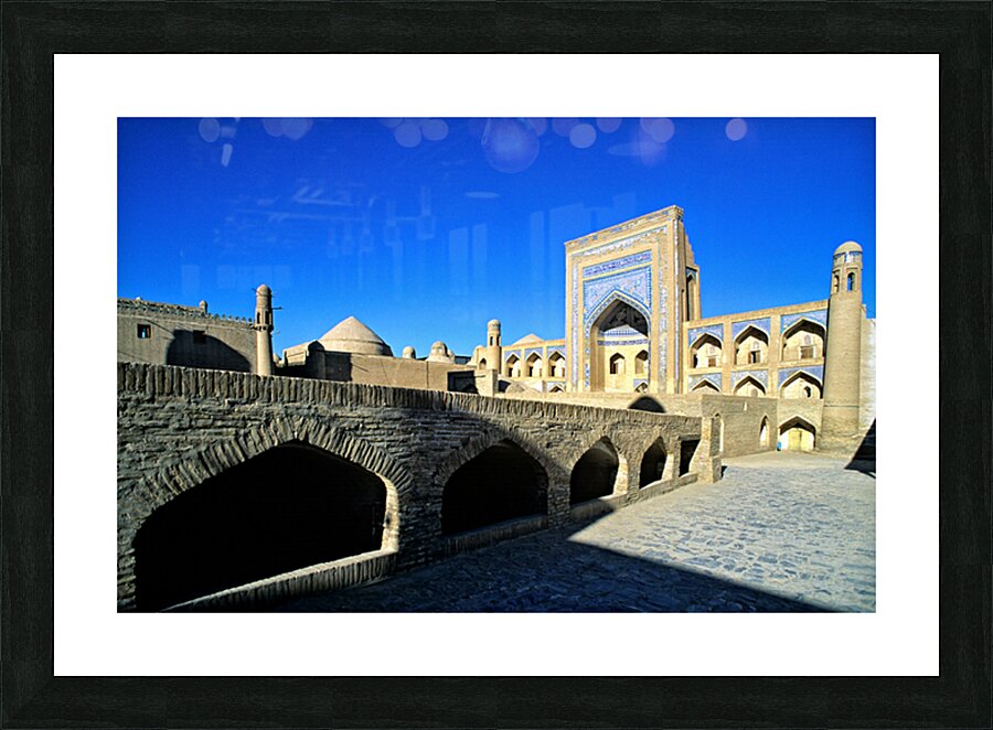 Exploring the ancient architecture in Khiva Uzbekistan Picture Frame print