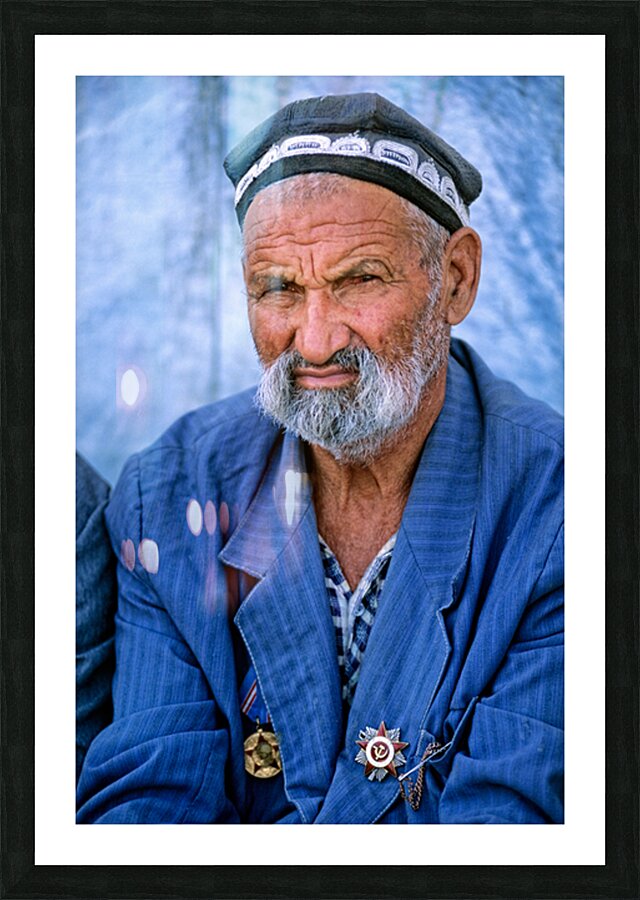Elderly man in Bukhara Uzbekistan engages in local culture Picture Frame print