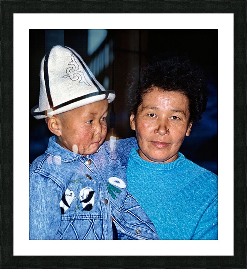 Uzbekistan mother and child in traditional attire during daytime Picture Frame print