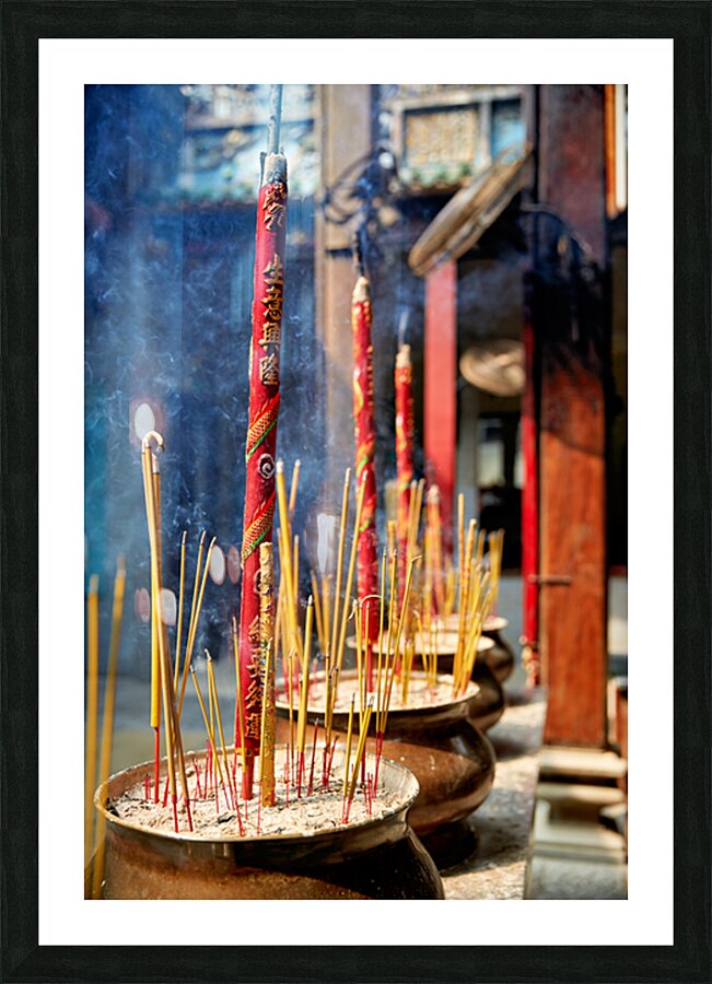 Incense sticks burning at a temple in Ho Chi Minh City Picture Frame print