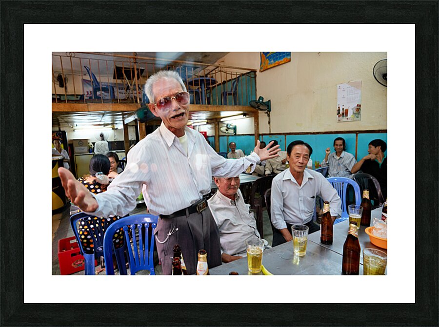 Men gather in Ho Chi Minh Vietnam for drinks and conversation Picture Frame print