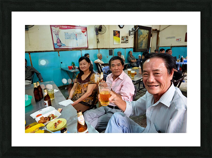 People enjoying time together in a cafe in Ho Chi Minh City Picture Frame print